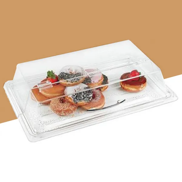 Bakery display tray holding freshly baked pastries on a counter