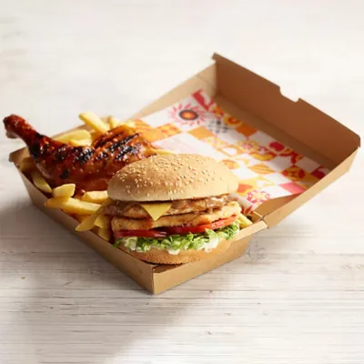 Printed burger clamshell holding a stacked burger with fried chicken and fries
