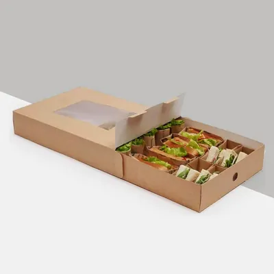 Kraft catering tray with a window lid holding a filled sandwich selection