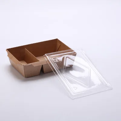 Two-compartment kraft tray with a clear lid lifted off