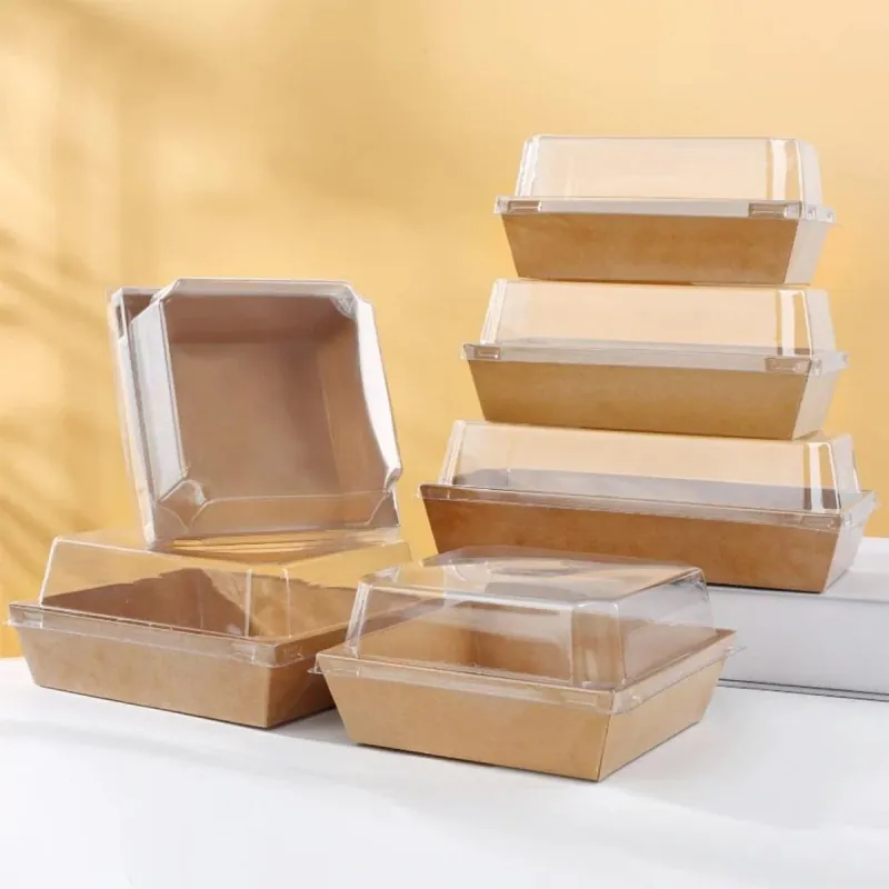 Range of kraft compartment trays with clear lids stacked together