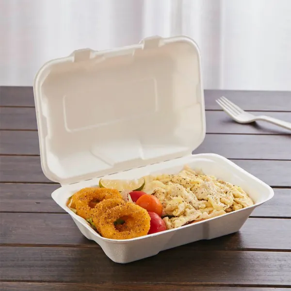 Moulded fibre clamshell tray open, holding a hot pasta meal