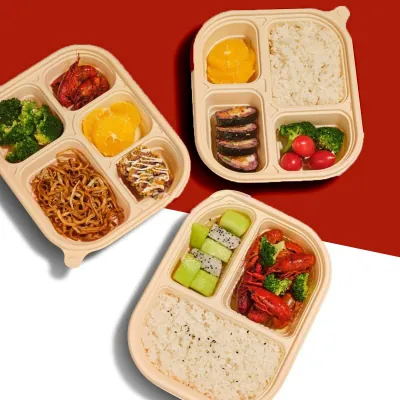 Moulded fibre compartment trays holding separated hot meal portions