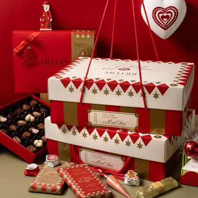 Festive red and white cookie boxes with lids and printed decoration