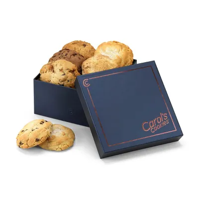 Navy cookie box with a lift-off lid holding chocolate chip cookies