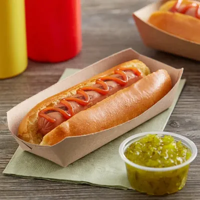 Kraft corn dog tray holding a hot dog with ketchup beside a relish pot