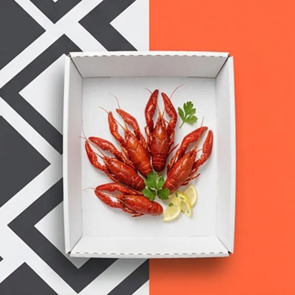 White corrugated crawfish tray holding boiled crawfish with garlic and herbs