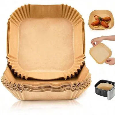 Square pleated paper air fryer liners shown with a basket air fryer