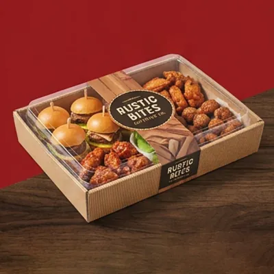 Party tray with a clear lid holding sliders, wings and popcorn chicken
