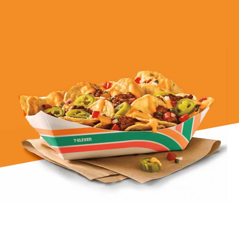 Printed nacho tray in green and red brand colours holding loaded tortilla chips