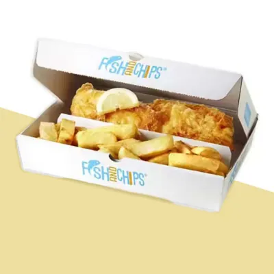 Printed fish and chips box holding battered fish and chips with a lemon wedge