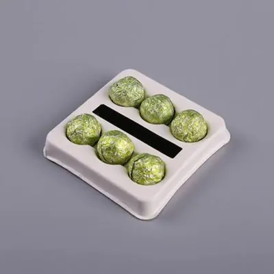 Moulded insert tray holding six iced cupcakes in individual wells