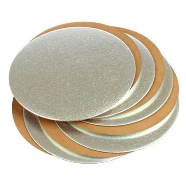 Stack of round cake boards with silver and gold foil finishes