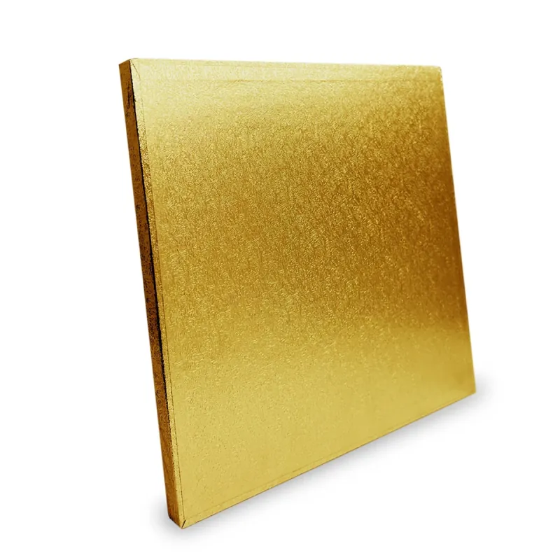 Gold foil square cake board shown at an angle
