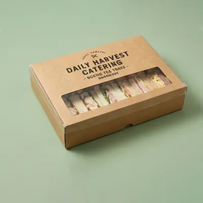 Kraft finger sandwich box printed with a catering brand and a long clear window