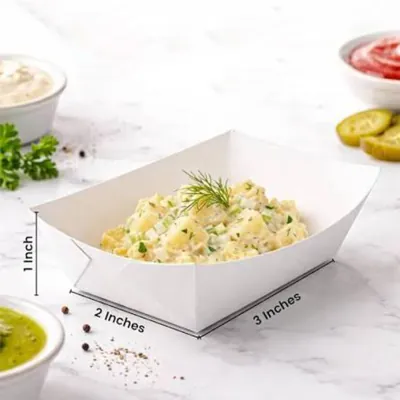 White paper food tray shown with its width and length dimensions marked